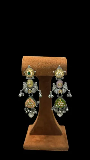 Ethnic Styles Inspired Earrings The design suggests a mix of tribal and Kundan influences combined with jhumka-like elements